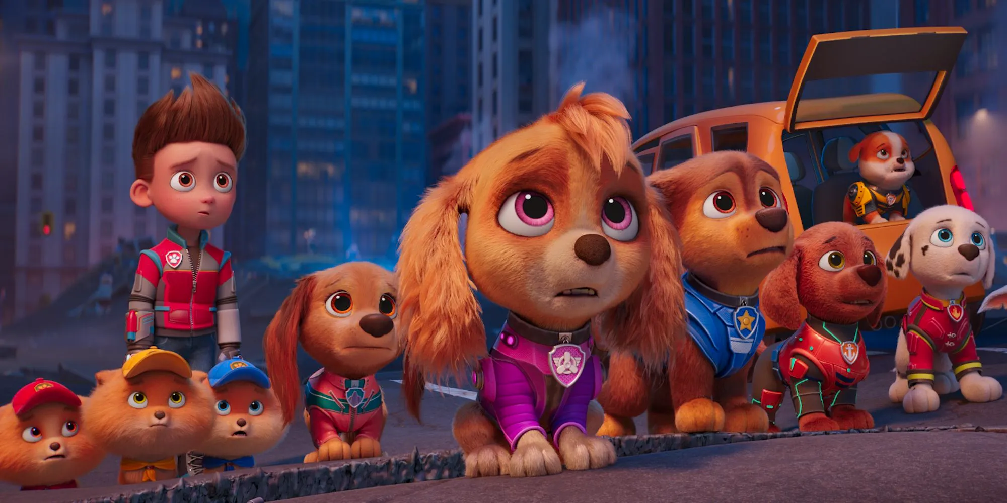 The pups and Ryder look up toward the sky with a disappointed look on their faces in PAW Patrol: The Mighty Movie Image