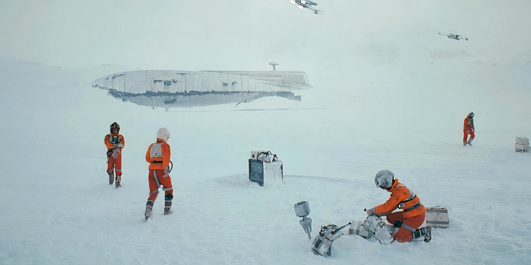 The rebels recover from battle as a transport prepares to take off in Star Wars: Episode V - The Empire Strikes Back. Image