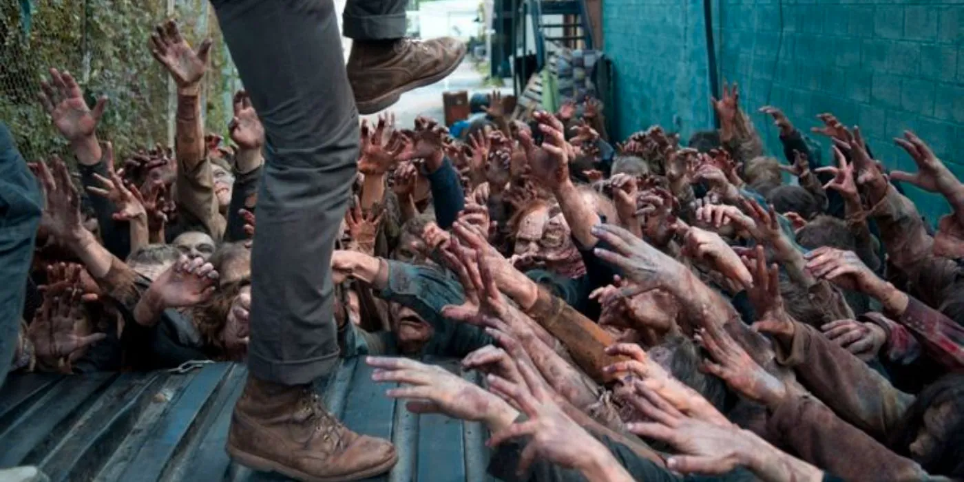 The Walking Dead Walkers reaching for Glenn Image