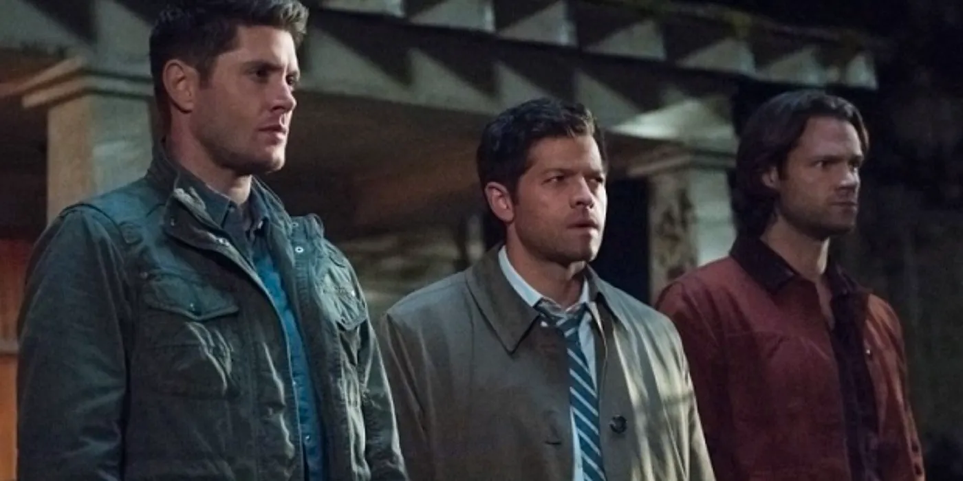 The Winchesters and Castiel lined up together in the Supernatural episode All Along the Watchtower Image