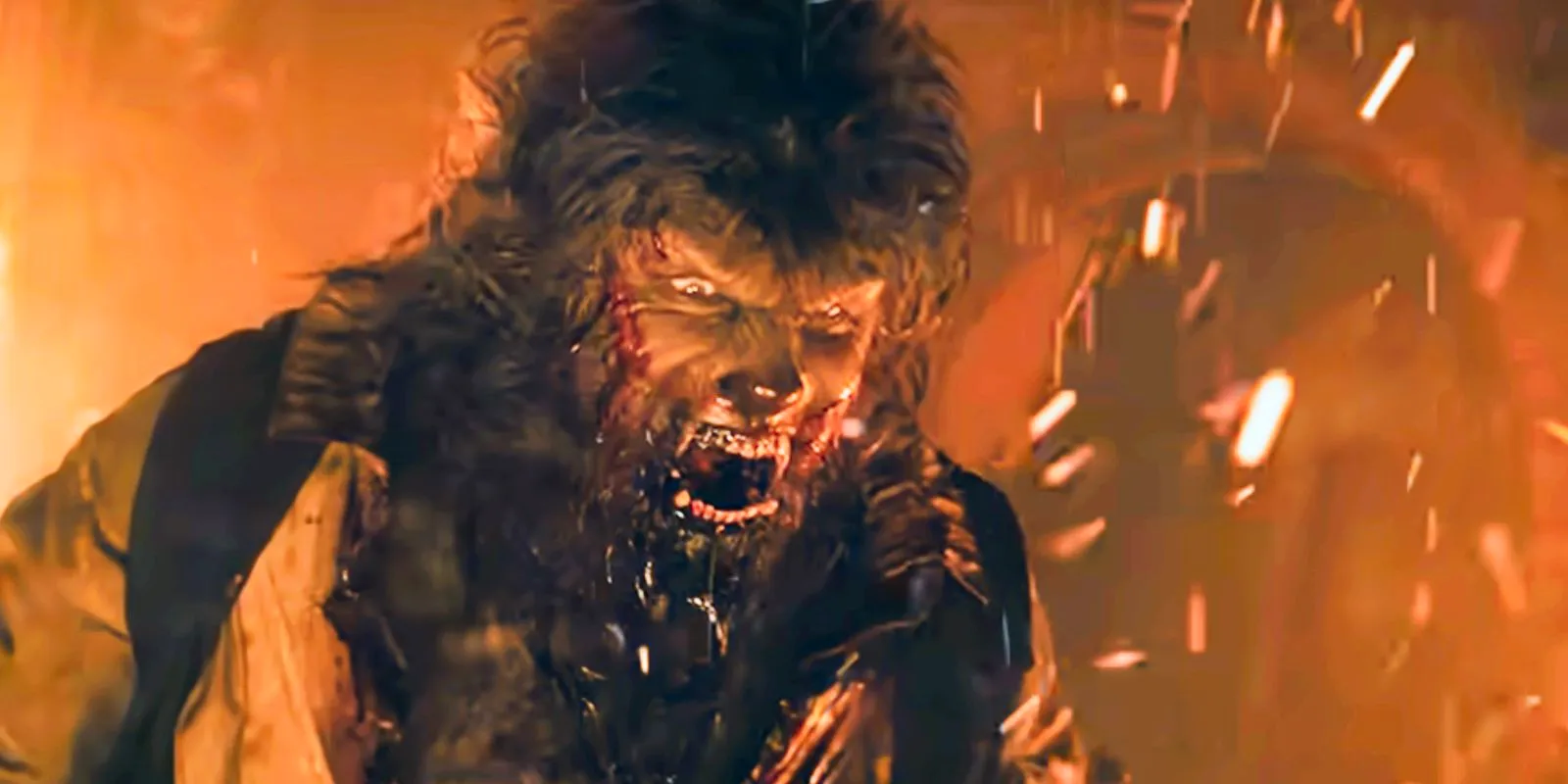 The Wolfman snarling amongst flames in Joe Johnston's The Wolfman Image