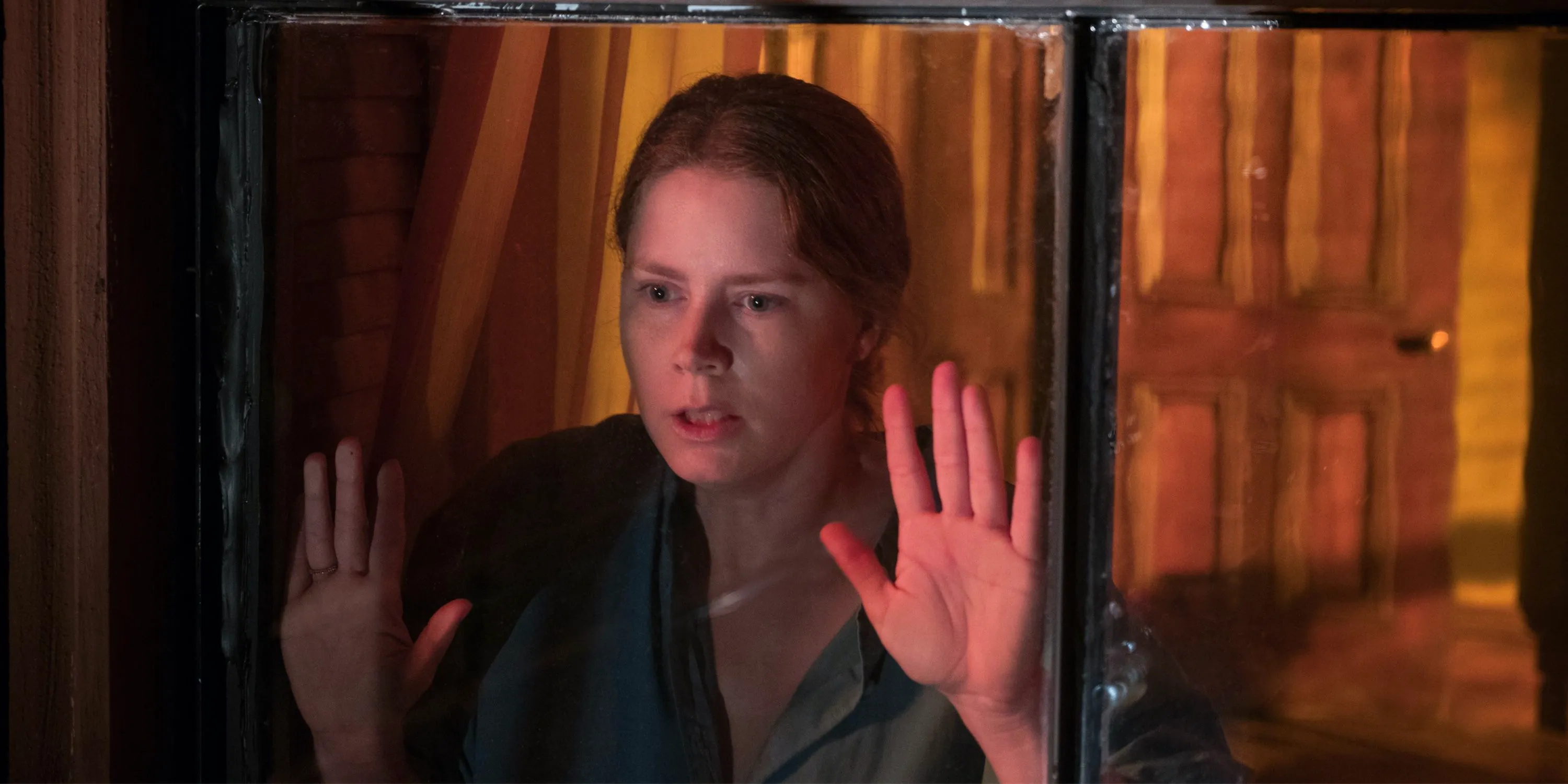 The Woman in the Window on Netflix - Amy Adams as Anna Fox in The Woman in the Window on Netflix - Amy Adams as Anna Fox in The Woman in the Window on Netflix Image