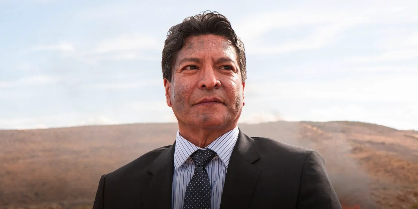 Thomas Rainwater's (Gil Birmingham) face covered in ash in Yellowstone. Image