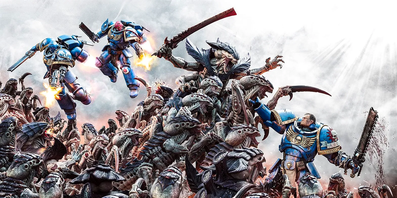 Three Space Marines attacking a large swarm of Tyranids in art from Warhammer 40K Space Marine 2. Image