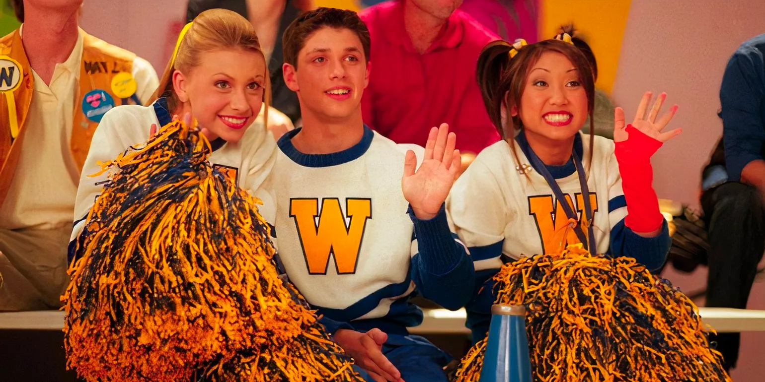 Tia with Phil and Keely as cheerleaders waving and smiling at someone off screen in Phil of the Future Image