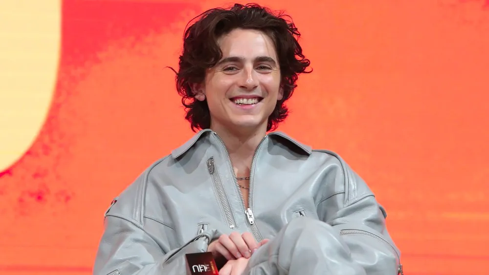 Timothée Chalamet Crashes Timothée Chalamet Lookalike Contest as NYPD Puts One Doppelganger in Cuffs Image