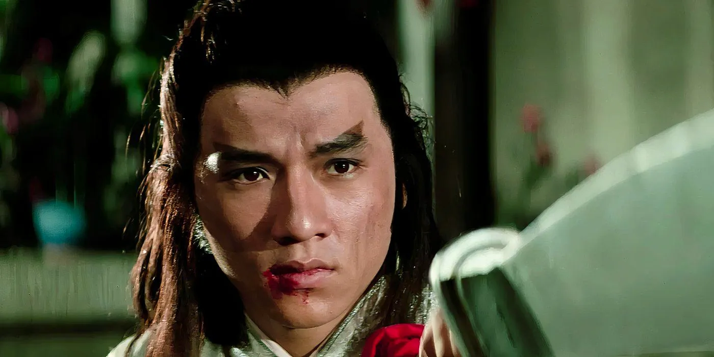 To Kill With Intrigue Jackie Chan in traditional kung fu attire with larger hair and eyebrows Image