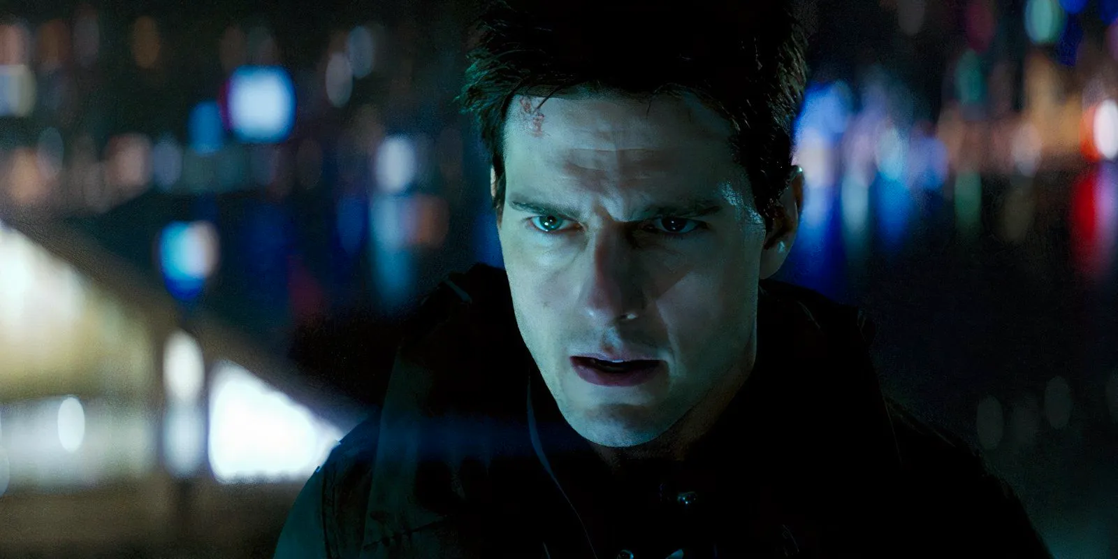 Tom Cruise looking intense as Ethan Hunt in Mission Impossible 3 Image