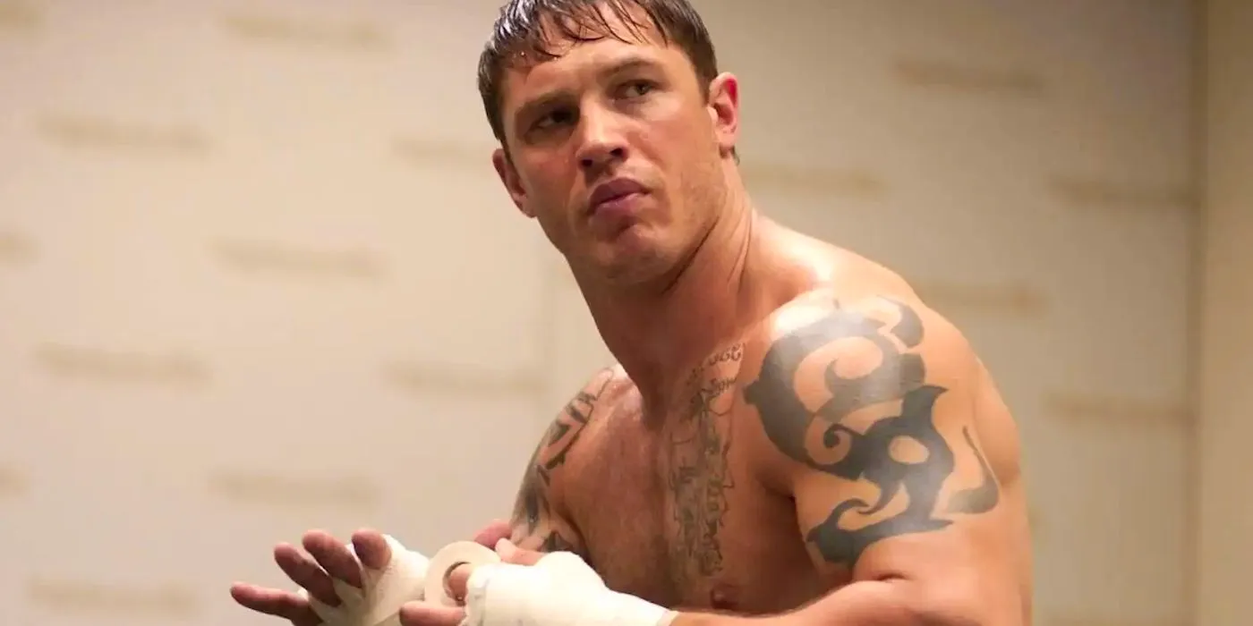 Tom Hardy taping up his hands in Warrior. Image