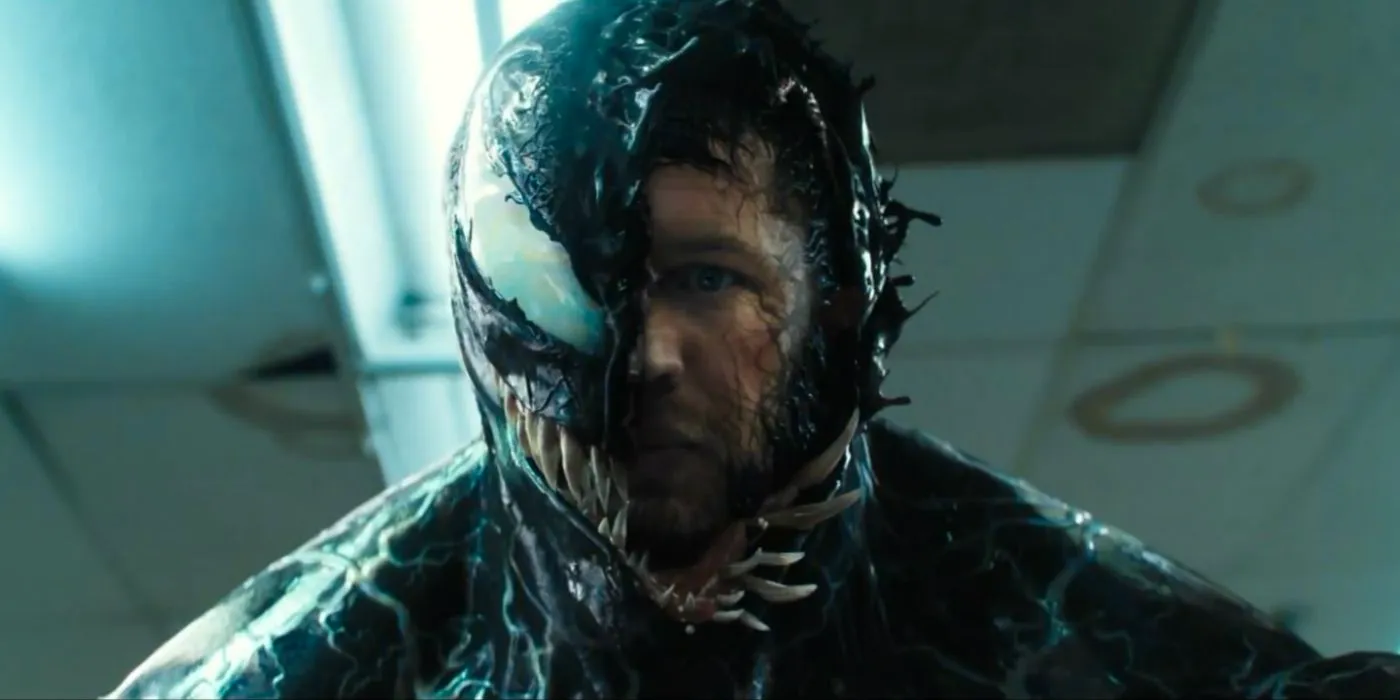 Tom Hardy's Eddie Brock bonds with Venom in Venom (2018) Image