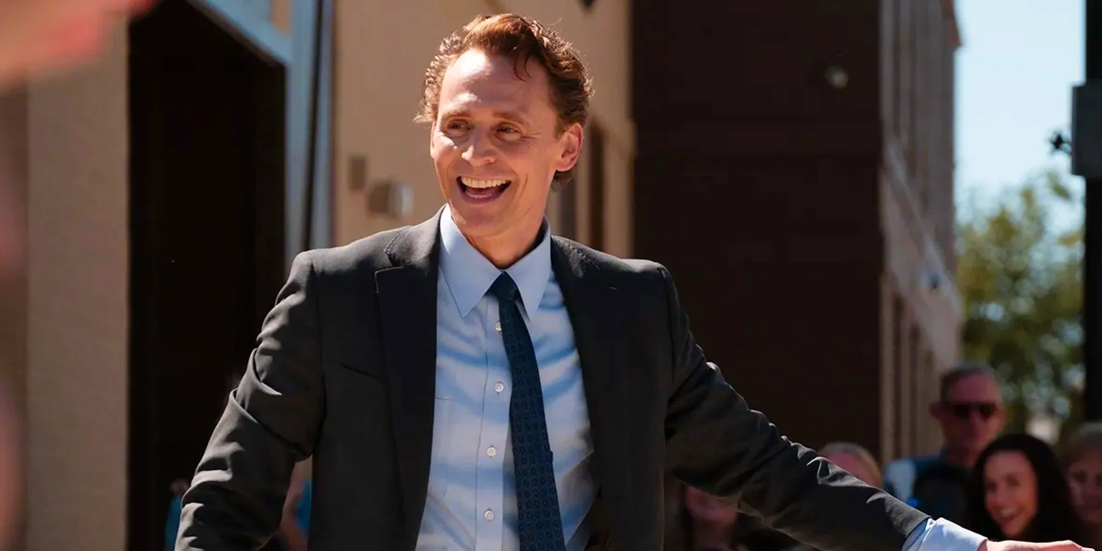 Tom Hiddleston as Chuck Krantz Smiling in The Life of Chuck Image