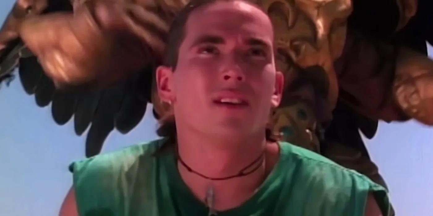 Tommy in Power Rangers' Green No More with Goldair appearing behind him Image