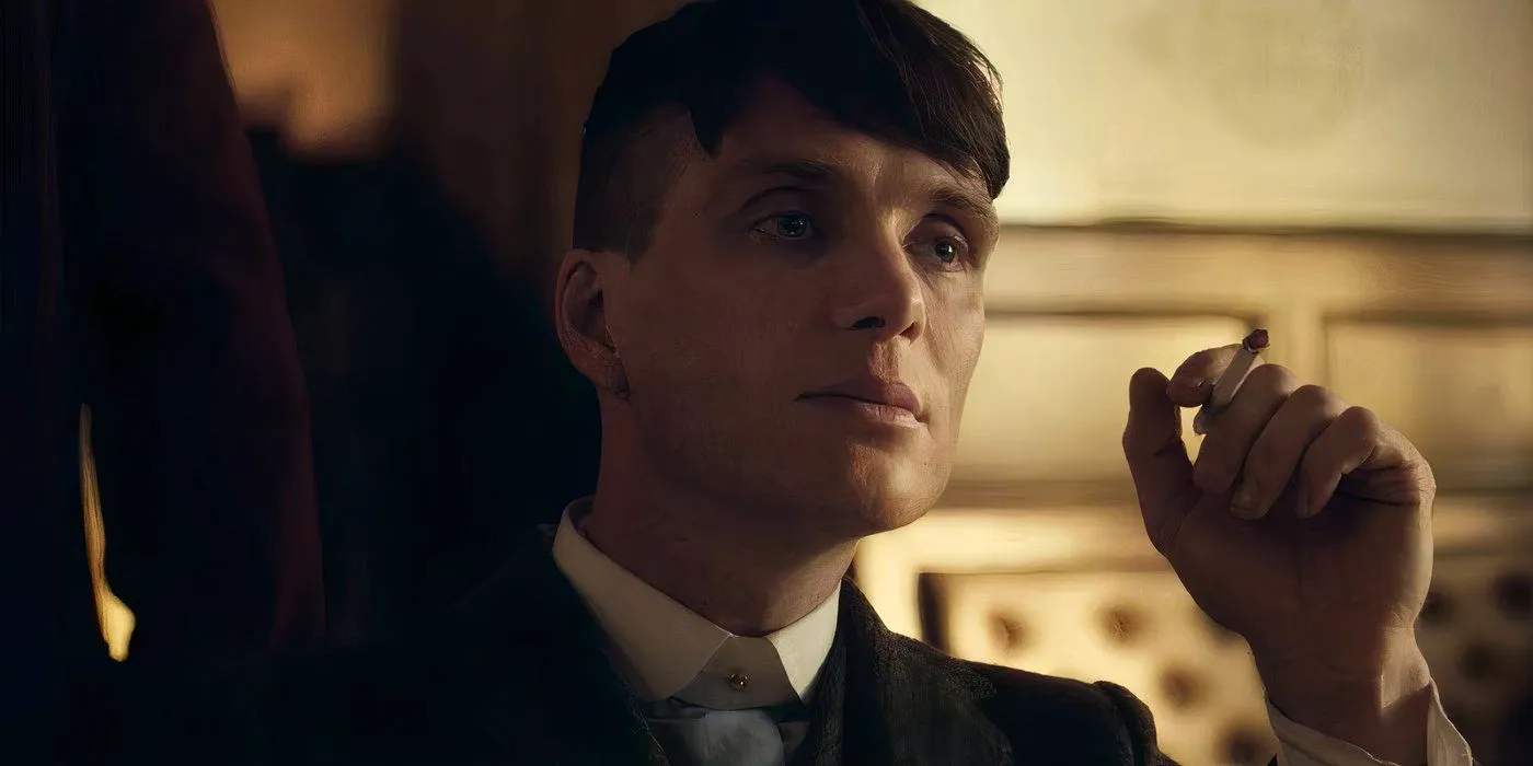 Tommy Shelby holding a cigarette in Peaky Blinders season 1 Image