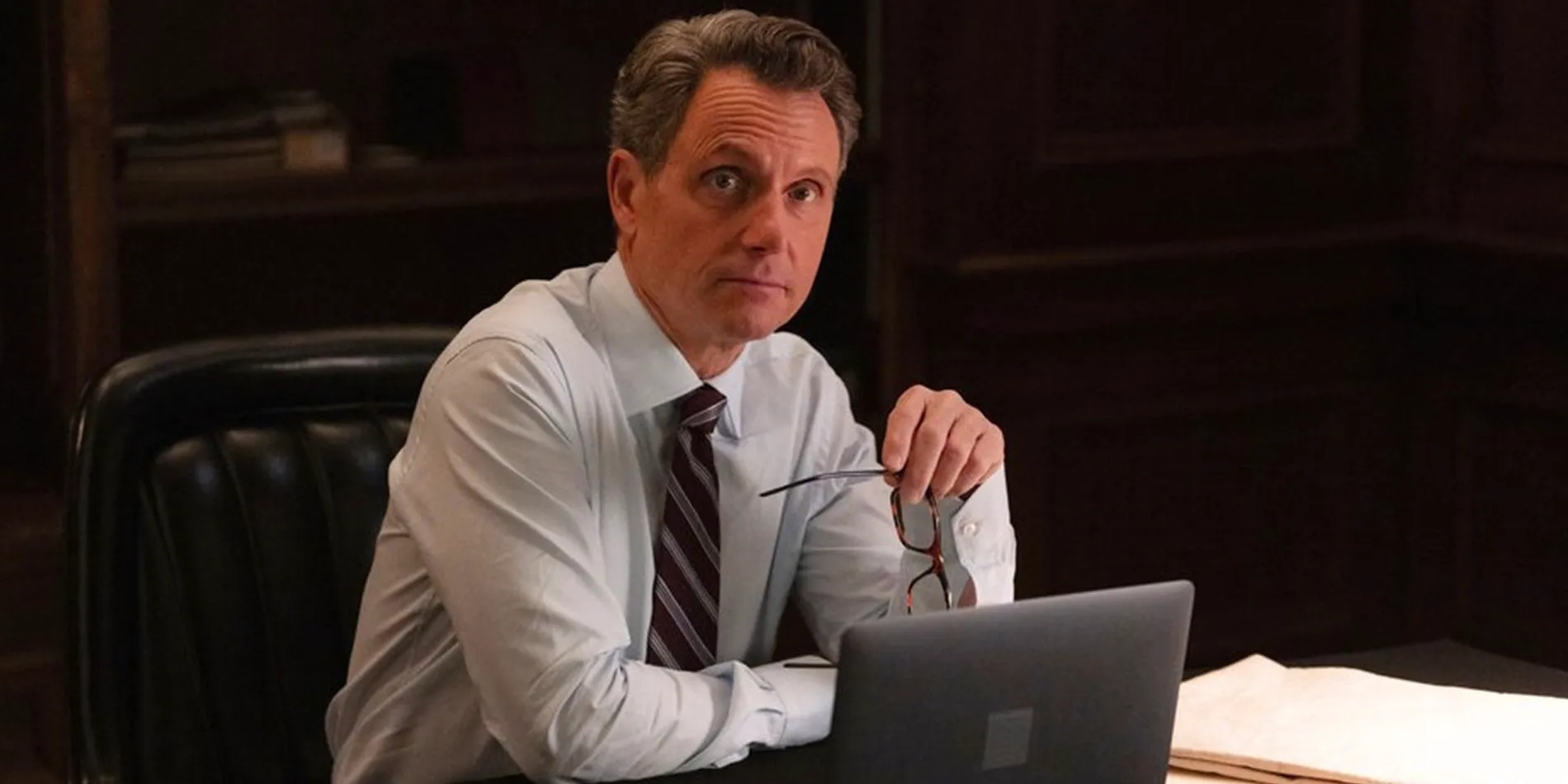 Tony Goldwyn using a laptop in Law and Order Image