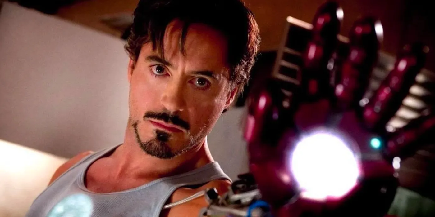 tony stark suiting up in iron man Image