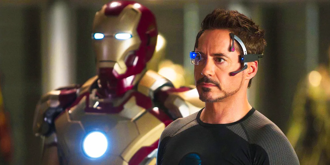 Tony Stark with remote controlled Iron Man suit in Iron Man 3 Image