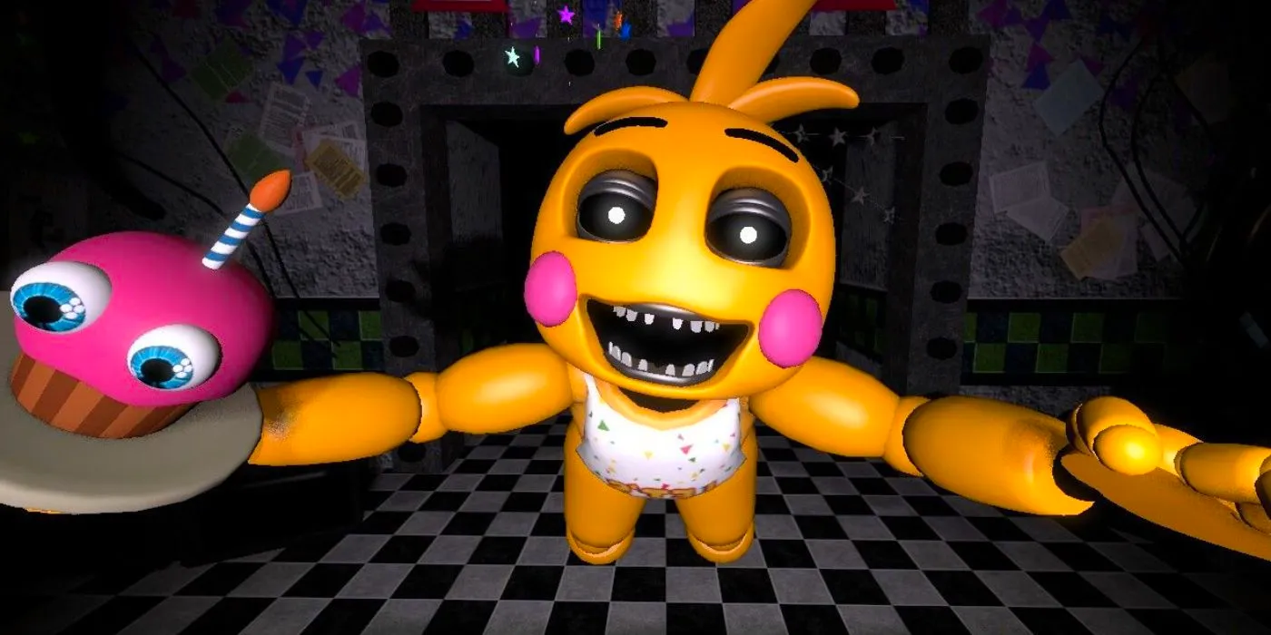 Toy chica and Toy Cupcake jump out at the night guard. Image