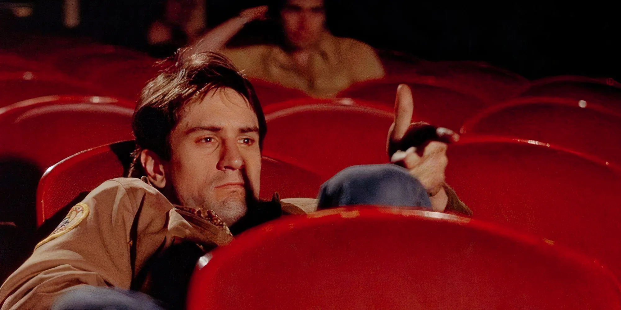 Travis in cinema in Taxi Driver Image