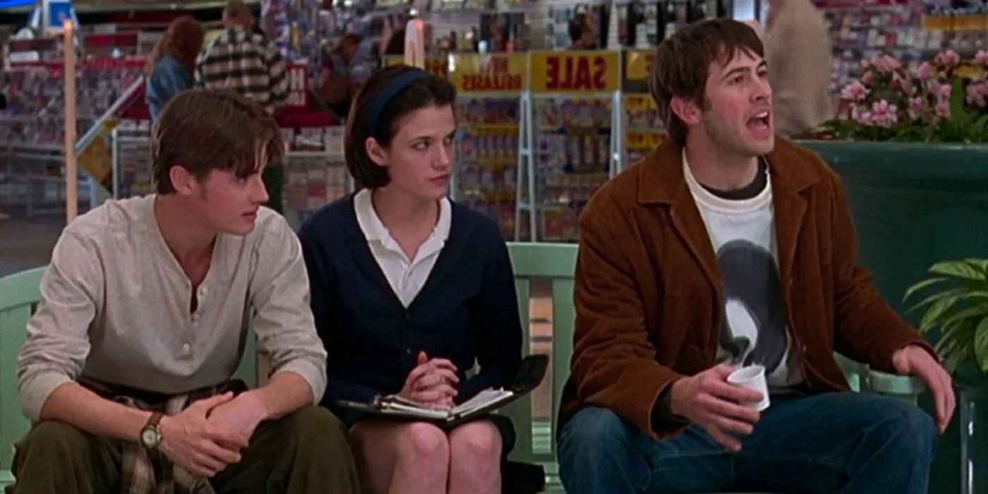 T.S. and Brodie sitting on a bench in the mall in Mallrats Image