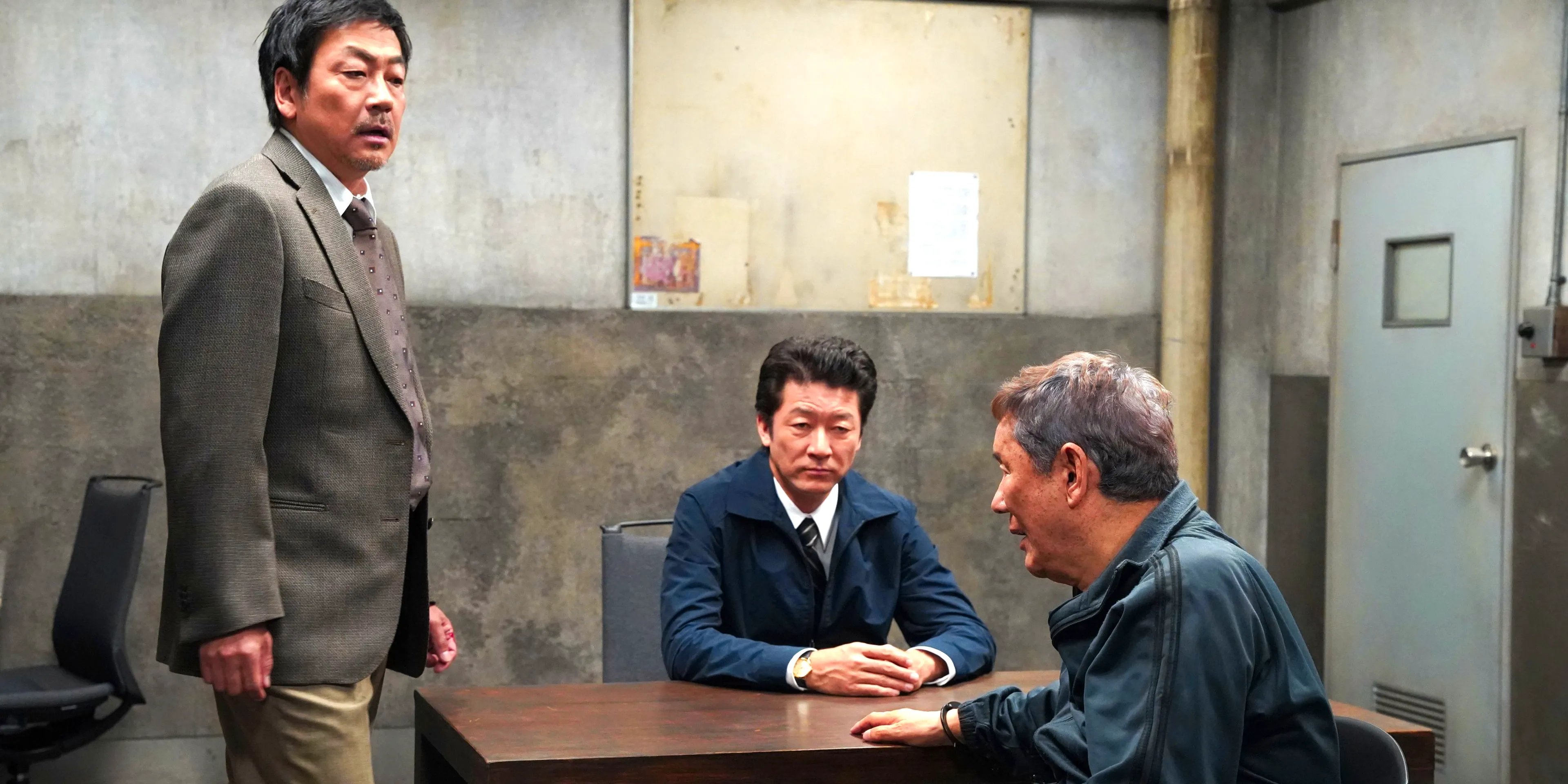 Two detectives interrogate Takeshi Kitano in Broken Rage Image