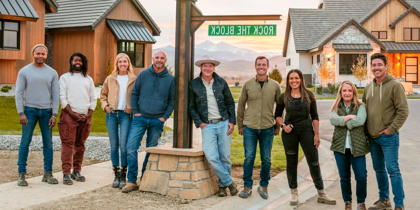 Ty Pennington and the renovators posing in front of a Rock the Block street sign. Image