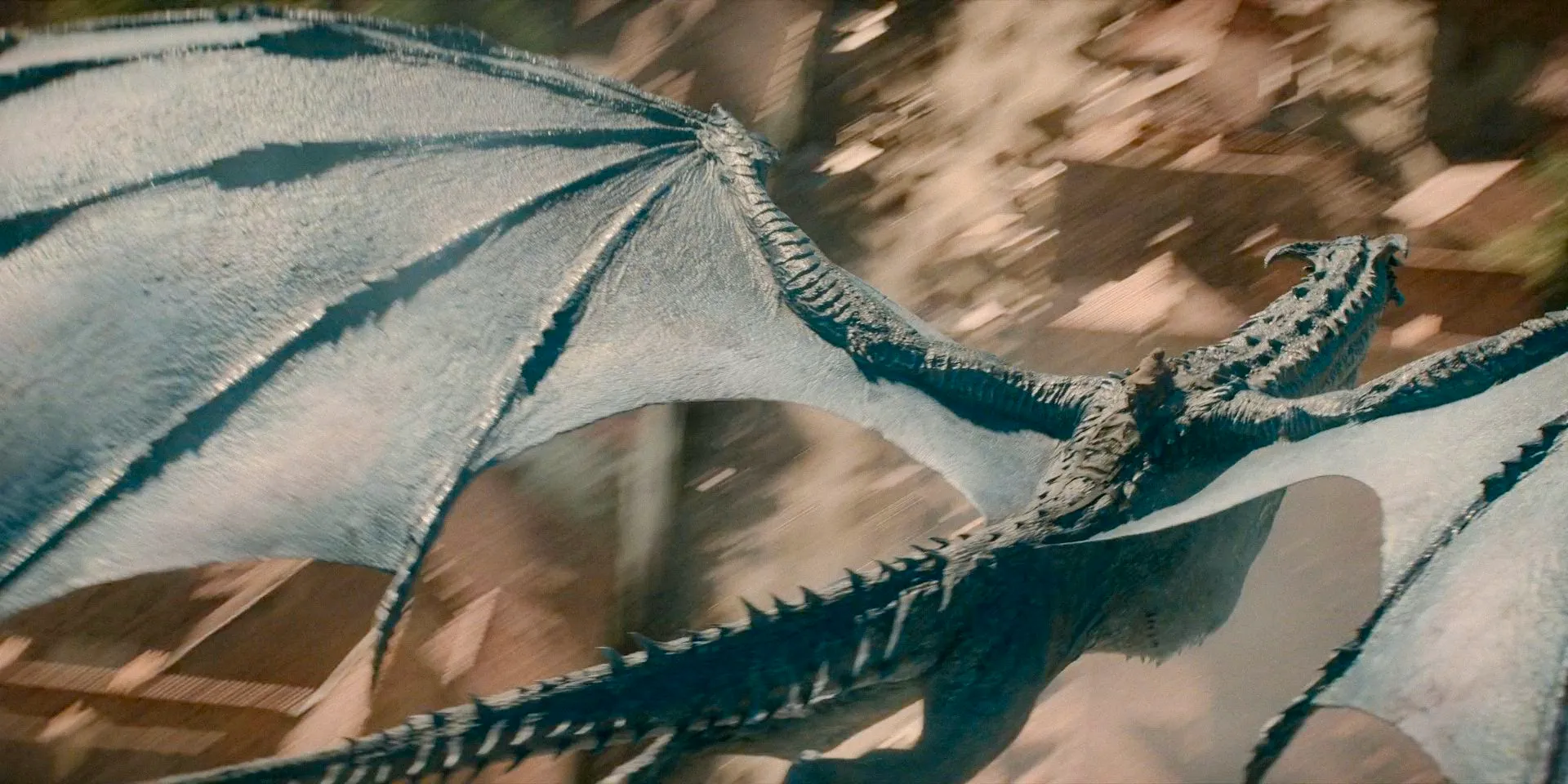 Ulf (Tom Bennett) and Silverwing flying over King's Landing in House of the Dragon Season 2 Episode 7 Image