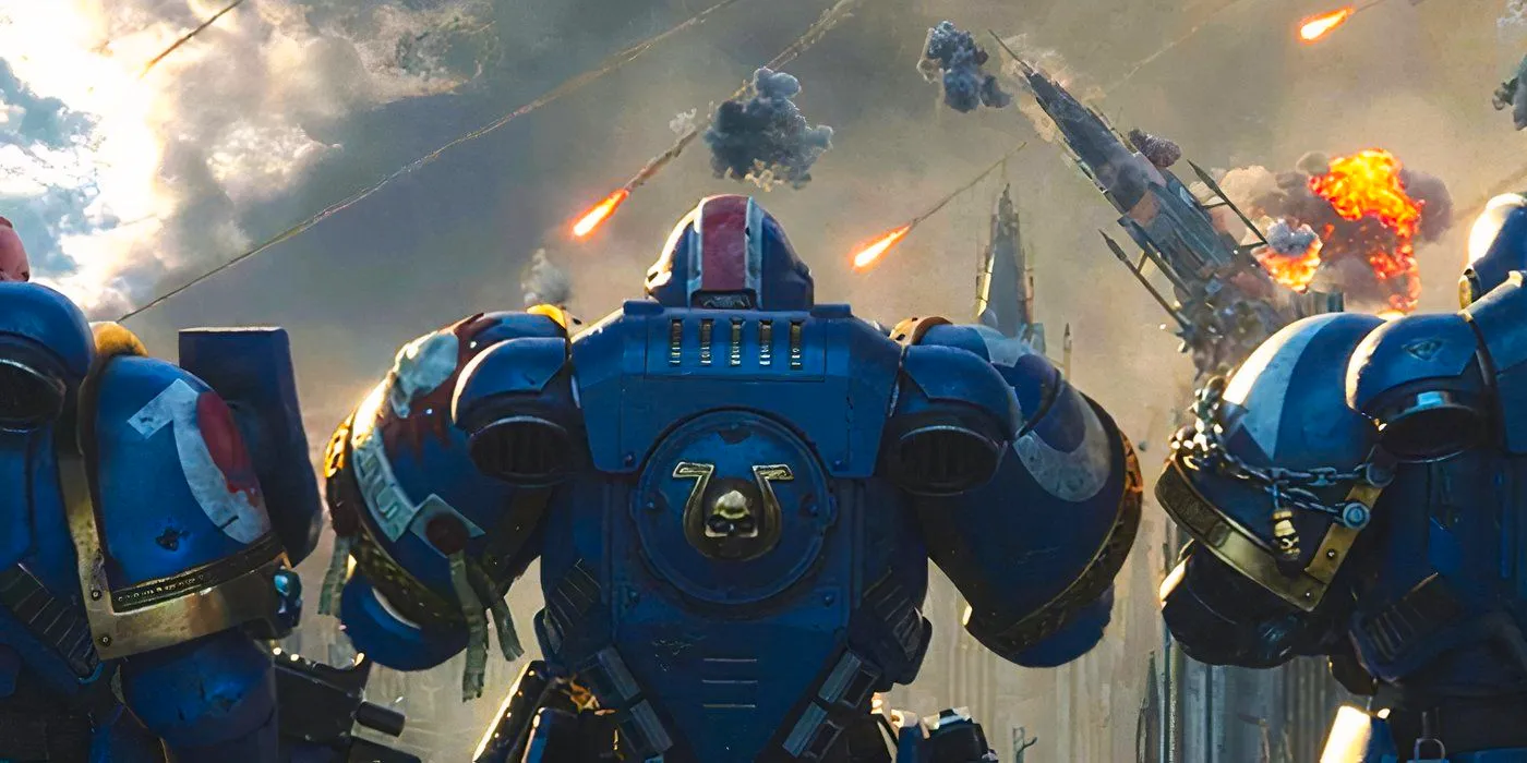 Ultramrines standing looking at explosions happening above them in Warhammer 40,000: Space Marine 2. Image