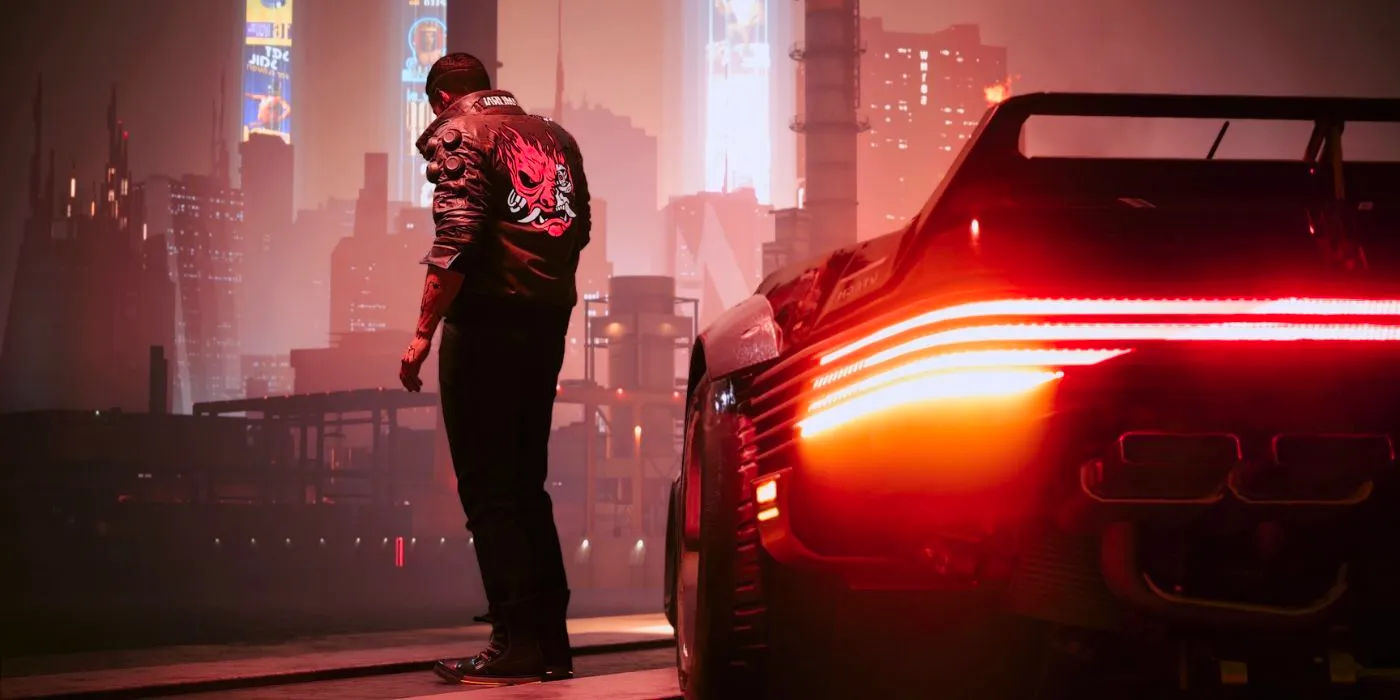 V in Cyberpunk 2077 standing alongside his car while Night City stretches before him Image