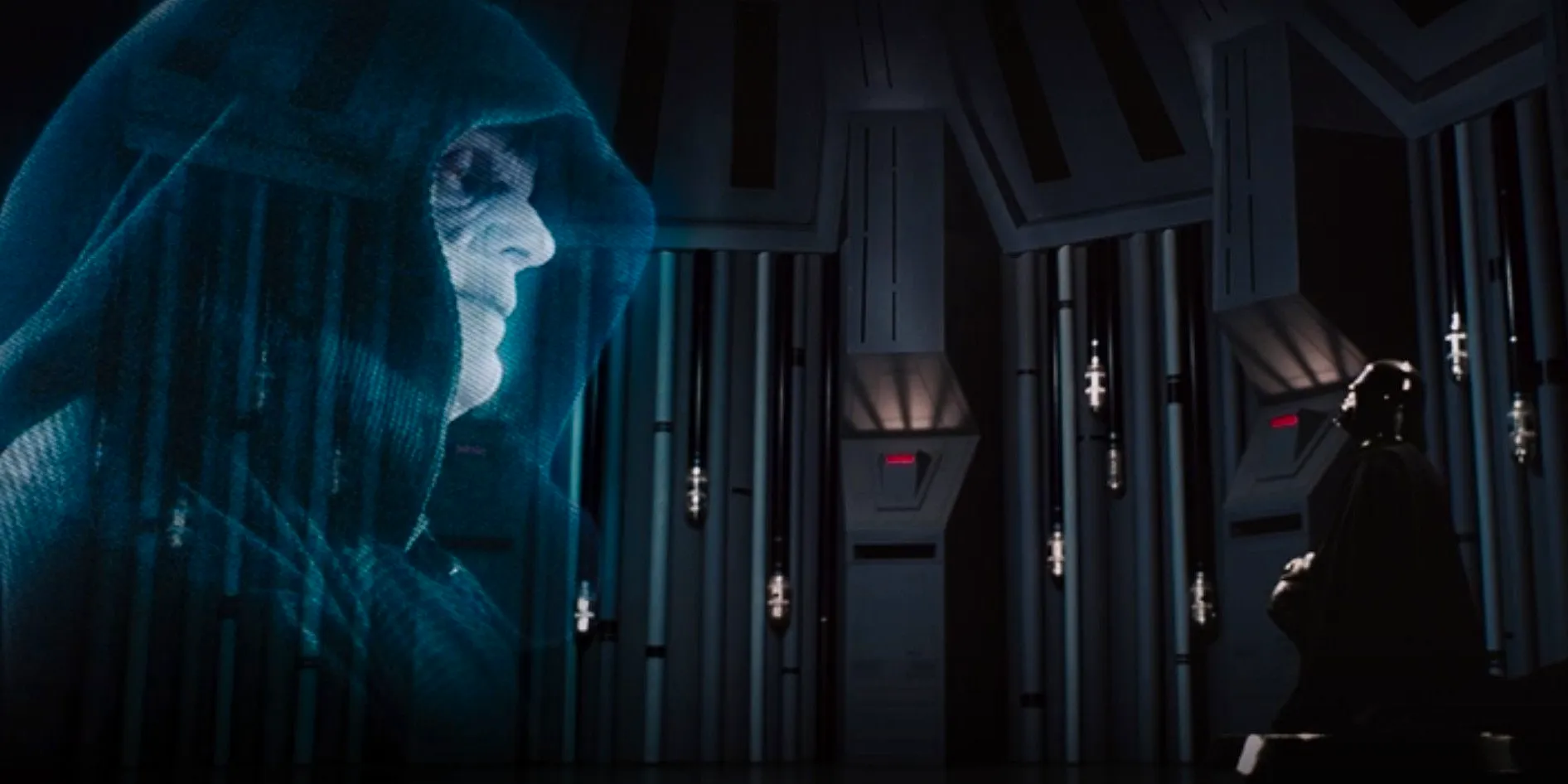 Vader looking at Palpatine's hologram in The Empire Strikes Back Image