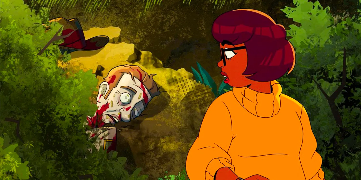 Velma discovers Sheriff Cogburn's body among the bushesin Velma season 2 ep 1 Image