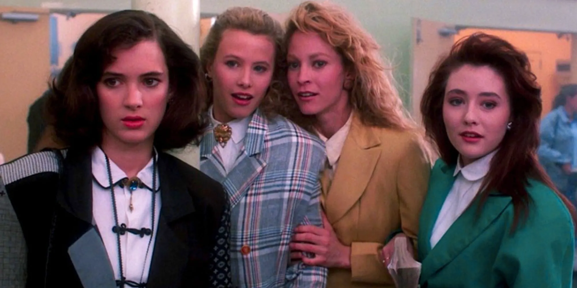 Veronica Sawyer with The Heathers by their lockers in Heathers Image