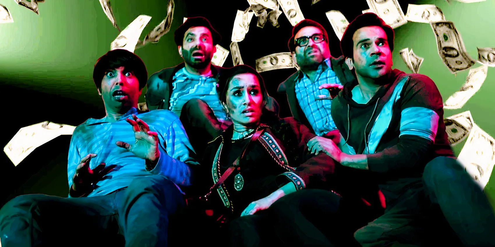 Vicky and his friends look scared in Stree 2 as money falls in the background Image