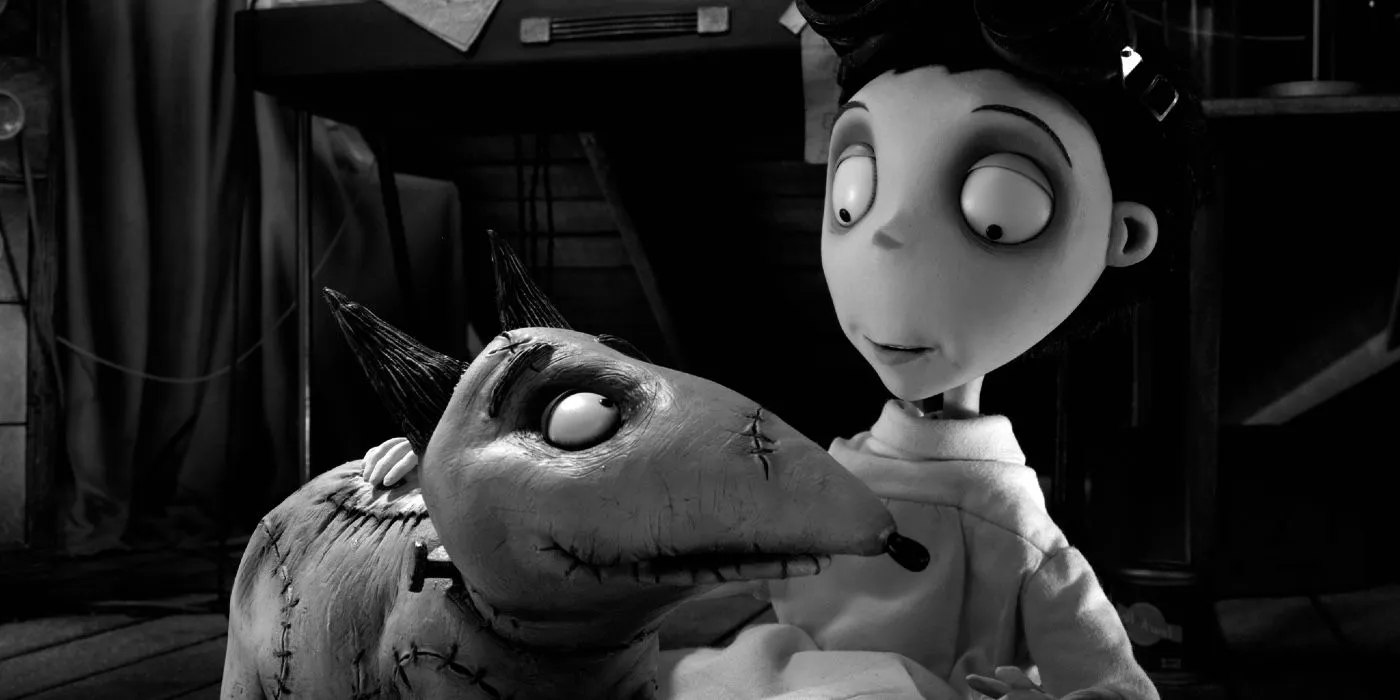 Victor and Sparky smile at each other in the movie Frankenweenie. Image