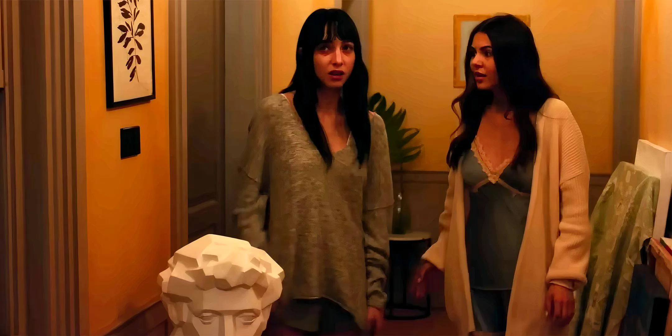 Victoria Justice's Grace and Devon Ross' Aria looking worried and standing in their hallway in Depravity Image