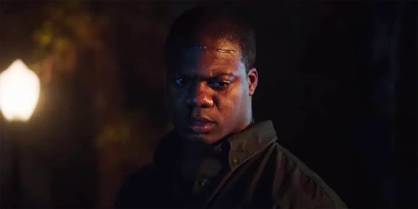 Walter looking down in the Get Out ending  Image