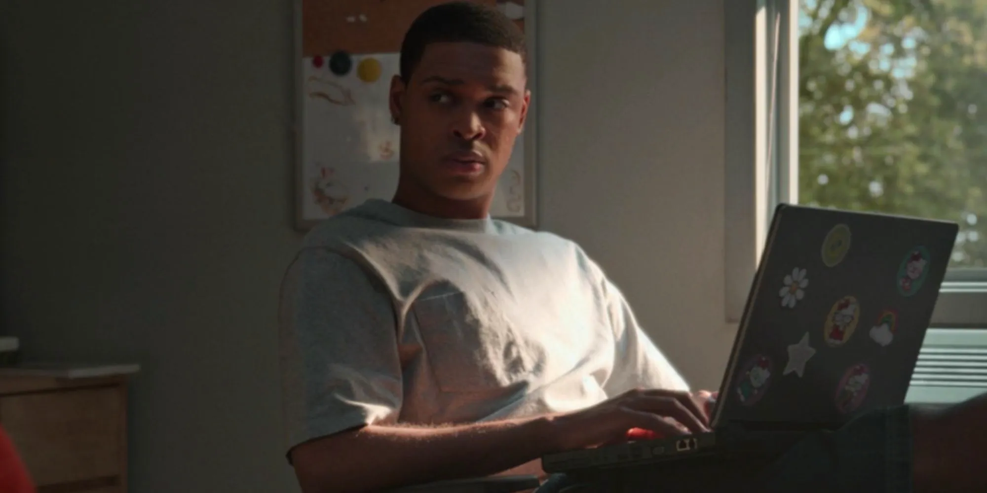 Warren Egypt Franklin on a laptop as Cam Newton in American Sports Story Image