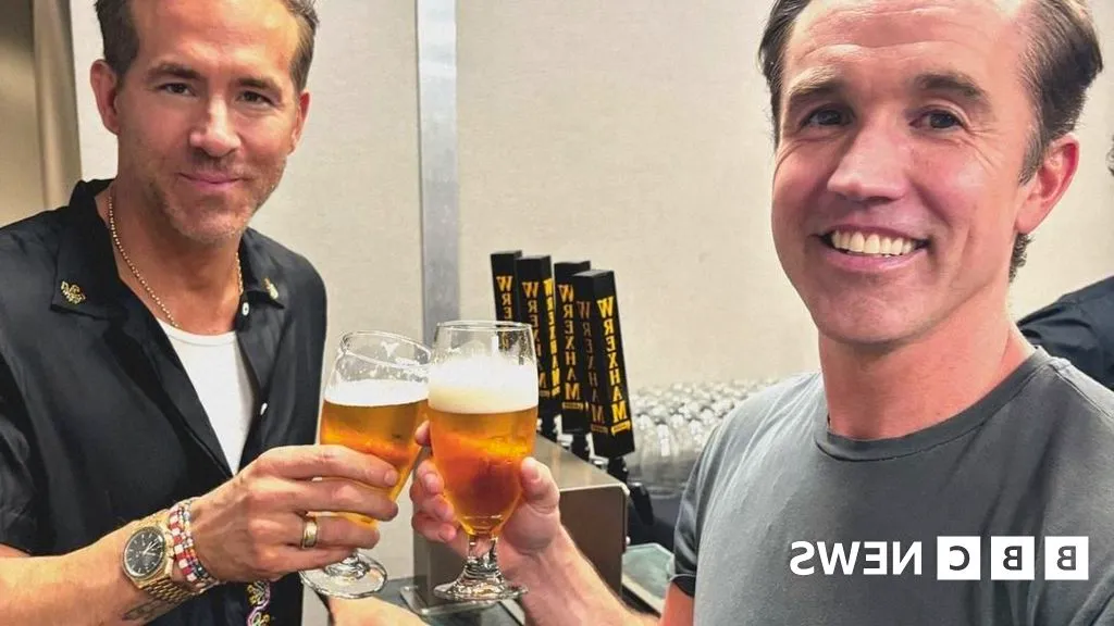 Wrexham AFC: Ryan Reynolds, Rob McElhenney buy half Wrexham Lager Image