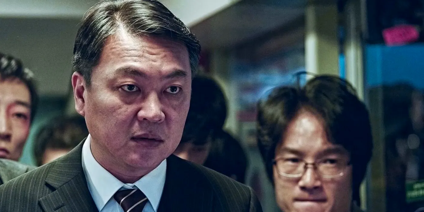 Yon-suk looks on dramatically in Train To Busan (2016) Image