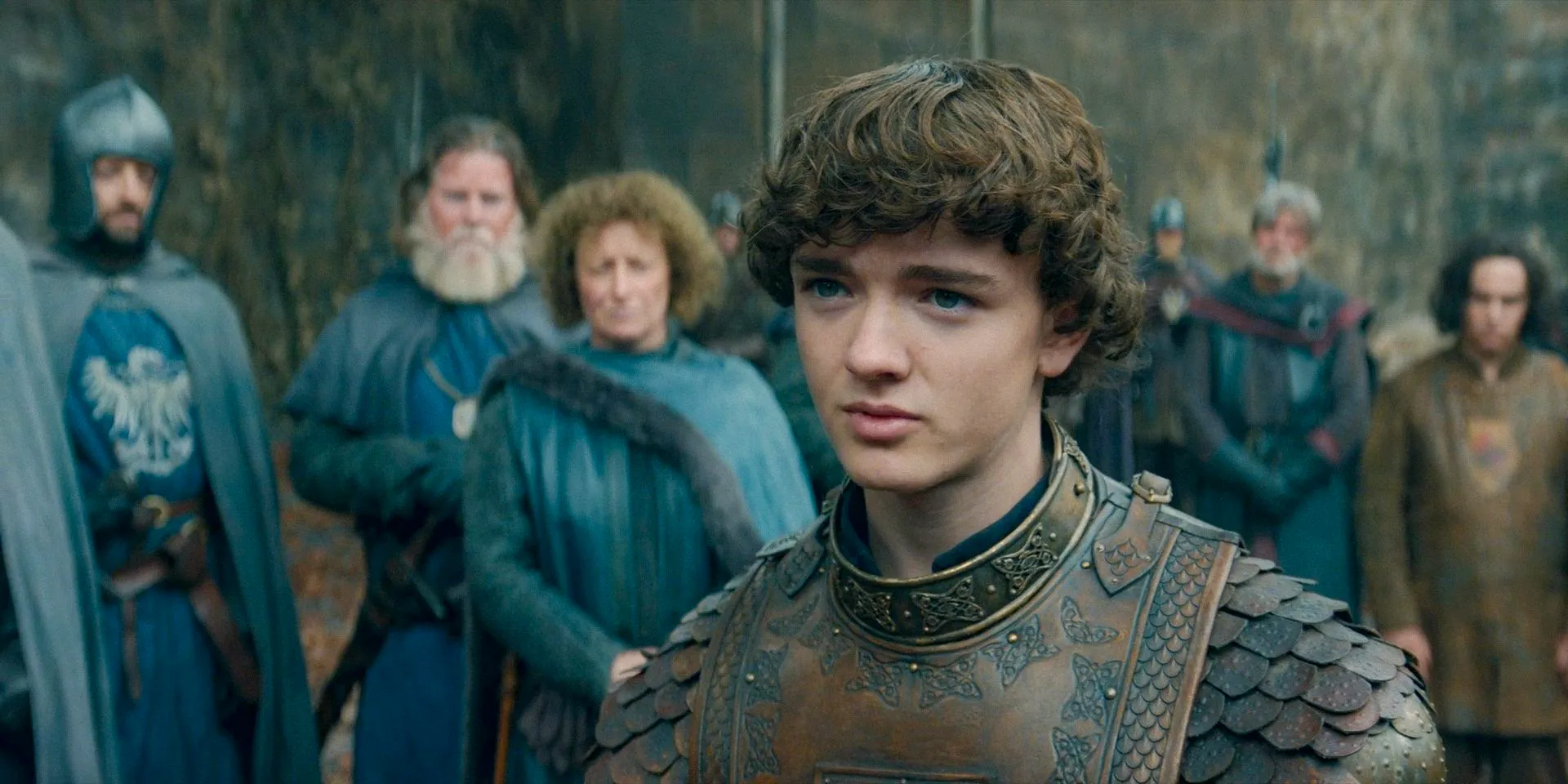 Young Ser Oscar Tully (Archie Barnes), who with his grandfather’s passing is now Lord of the Riverlands in House of the Dragon Season 2 Episode 7 Image