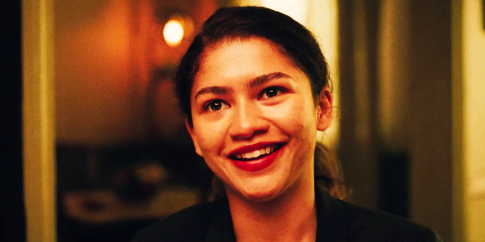 Zendaya smiling as Rue in Euphoria season 2 Image