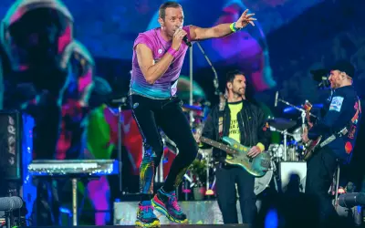 Chris Martin FALLS Through Stage Trapdoor During Coldplay Concert! Hilarious Video Goes Viral!